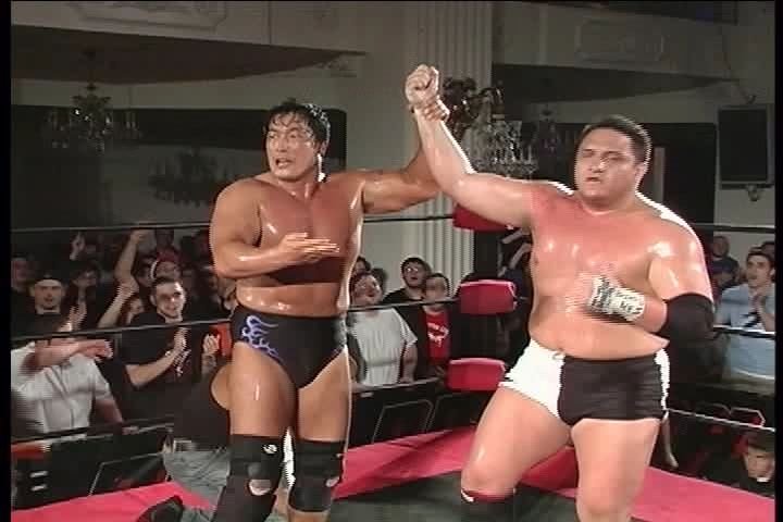Kenta Kobashi raises Samoa Joe's hand after literally beating the shit out of him. (Source)