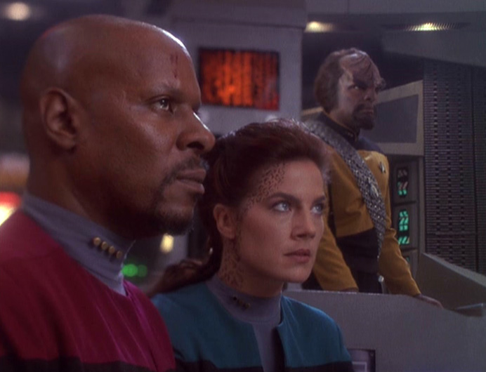 Captain Benjamin Sisko (Avery Brooks), and Lieutenants Dax (Terry Farrell) and Worf (Michael Dorn) in the action-packed Season Four relaunch.