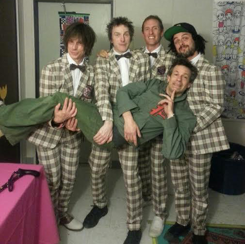 The Replacements doing a little labor carrying their frontman