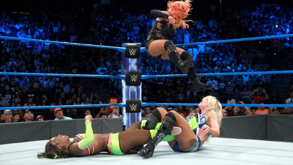Naomi, Becky Lynch, and Carmella battle for a shot at Natalya's title.